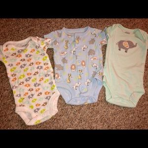 Newborn baby boy onesies .